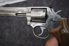 Load image into Gallery viewer, 18:  Smith &amp; Wesson Model 686-3 in 357 Mag with 6&quot; Barrel and Class C Engraving Wild Wild Westlake
