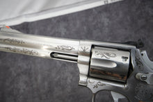 Load image into Gallery viewer, 18:  Smith &amp; Wesson Model 686-3 in 357 Mag with 6&quot; Barrel and Class C Engraving Wild Wild Westlake
