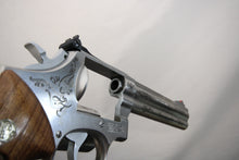 Load image into Gallery viewer, 18:  Smith &amp; Wesson Model 686-3 in 357 Mag with 6&quot; Barrel and Class C Engraving Wild Wild Westlake
